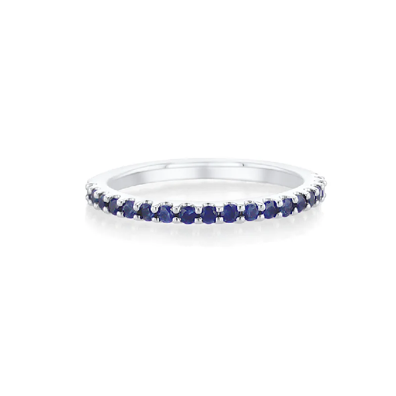 Custom crystal rings for sparkling beauty -0.50 Cttw Round Blue Sapphire Platinum Eternity Band