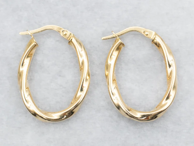 Bold statement earrings for attention-grabbing looks -Oval Gold Twist Hoop Earrings