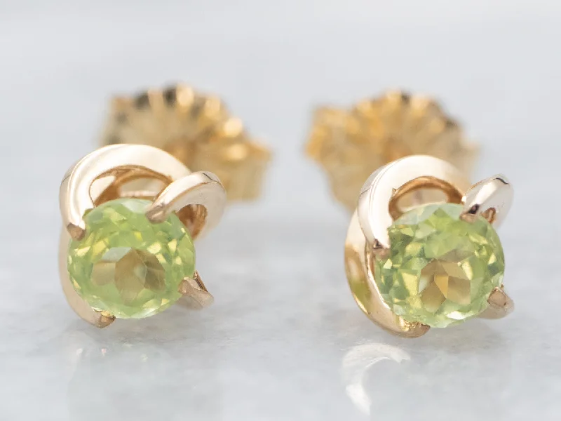 Classic pearl earrings for formal attire -Yellow Gold Peridot Swirl Stud Earrings