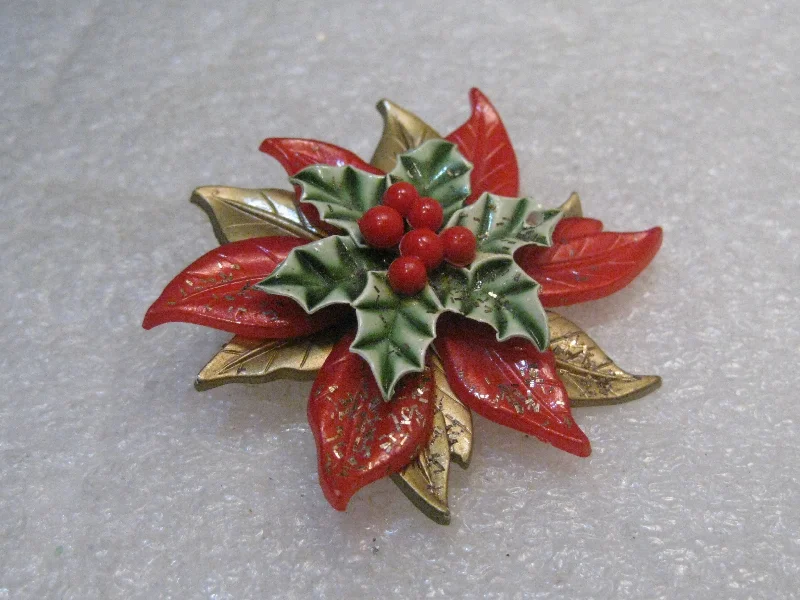 Brooch with metal leaves-Vintage Poinsettia Christmas Brooch, Layered, 1960's, 2" Spins, Red, Green, Gold