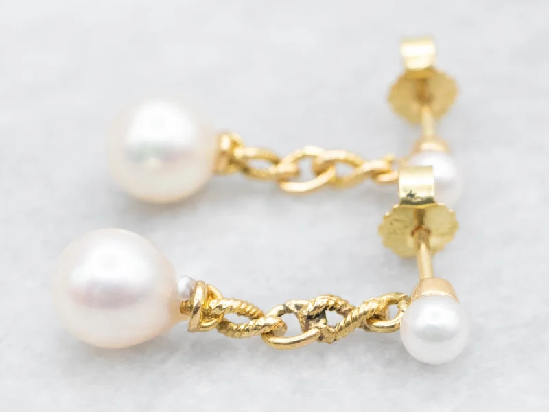 Luxury gemstone earrings with sapphires -Twisting Gold Pearl Drop Earrings