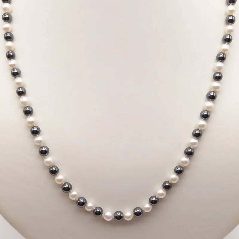 Crystal and gemstone necklaces for added sparkle -Genuine Pearls and Hematite Necklace