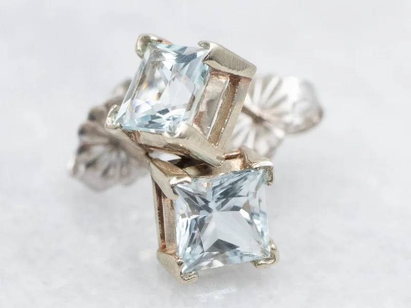 Designer gold earrings for exclusive fashion -Princess Cut Aquamarine Stud Earrings