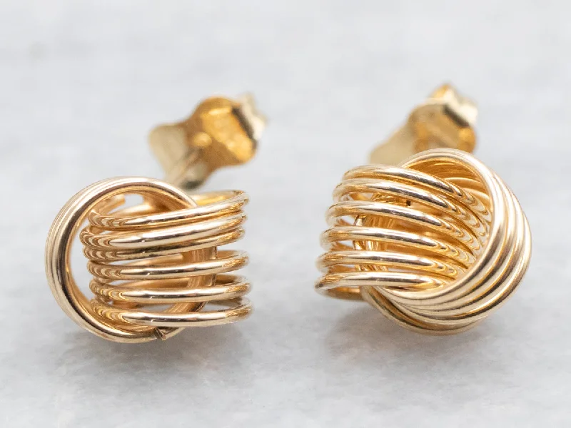 Trendy gemstone earrings for modern fashion -Polished Gold Knot Stud Earrings