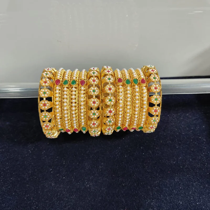 Elegant sapphire bangles for luxury outfits -Pooja Bangles Gold Plated Pearl And Pota Stone Bangle Set